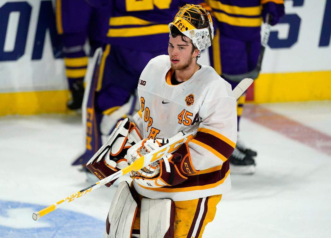 Minnesota goaltender Jack LaFontaine heads back to the net during a time out against Minnesota State in the second period of an NCAA College Hockey Regional Final Sunday, March 28, 2021, in Loveland, Colo. (AP Photo/David Zalubowski)