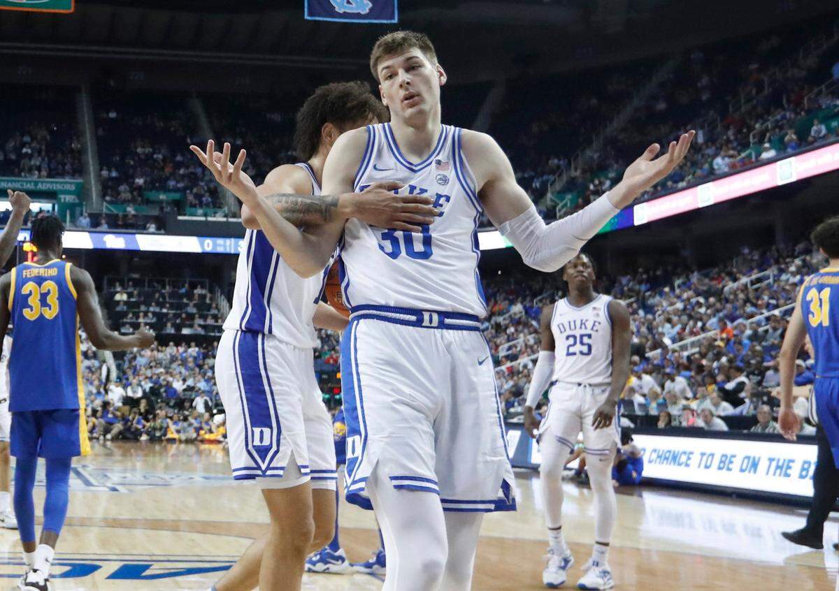 Duke’s Kyle Filipowski (30) reacts after he made the baske while being fouled during Duke’s 96-69 victory over Pitt in the quarterfinals of the ACC Men’s Basketball Tournament in Greensboro, N.C., Thursday, March 9, 2023.