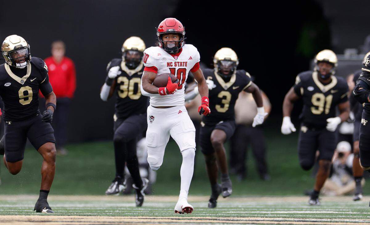 N.C. State’s KC Concepcion (10) breaks free on a 65-yard run during the first half of N.C. State’s game against Wake Forest at Allegacy Stadium in Winston-Salem, N.C., Saturday, Nov. 11, 2023.