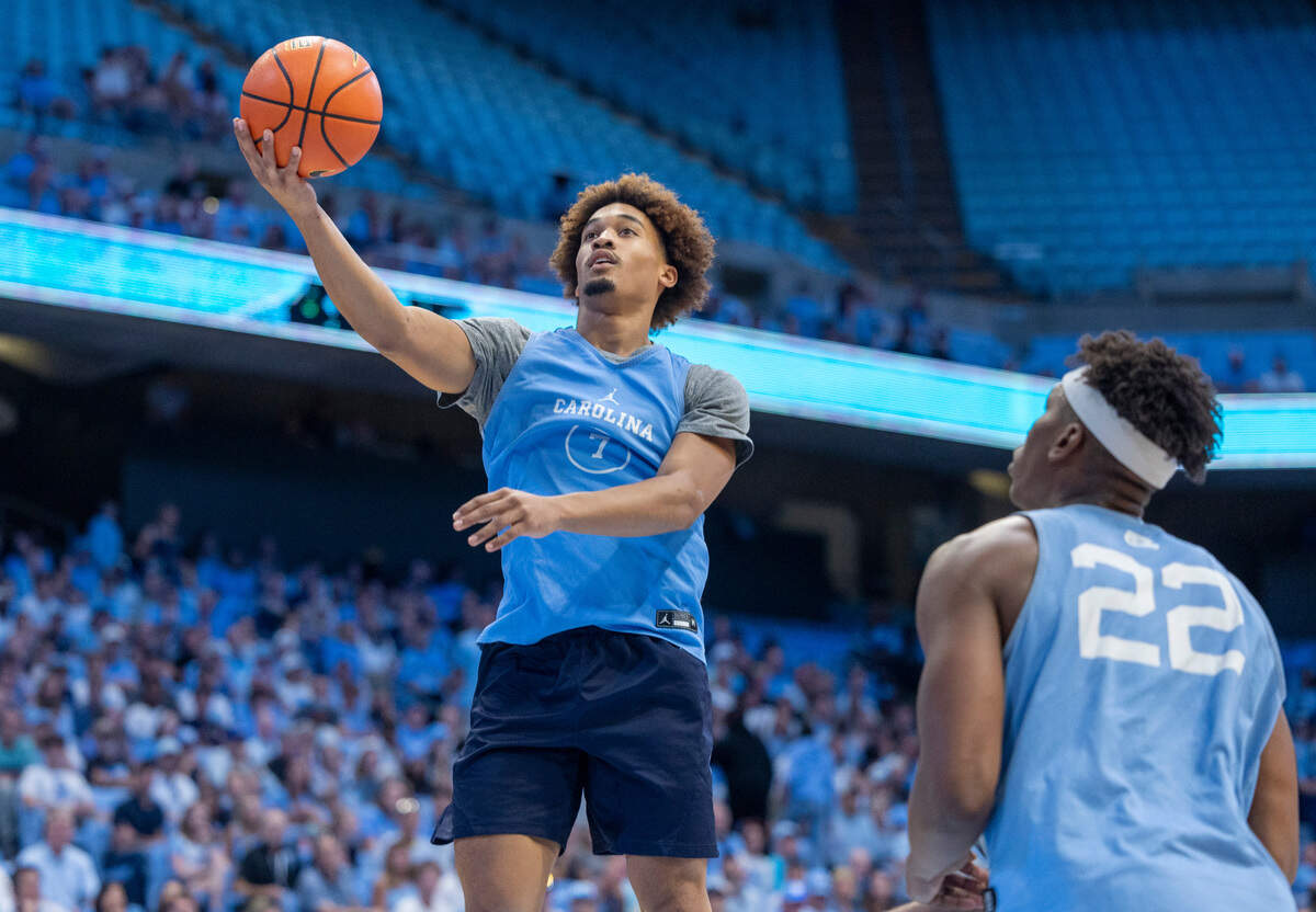 North Carolina’s Seth Trimble (7) breaks to the basket against Ven-Allen Lubin (22) in the first half during the Tar Heels’ Blue vs. White scrimmage on Saturday, October 12, 2024 at the Smith Center in Chapel Hill, N.C.