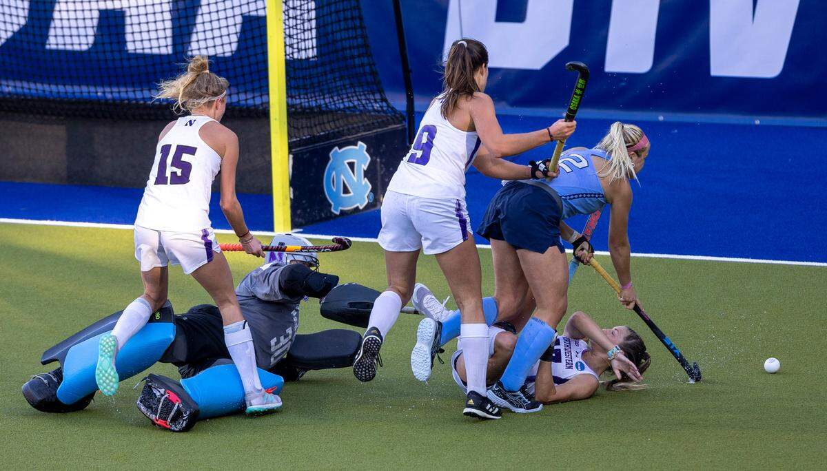 North Carolina’s Ryleigh Heck (12) tries to score over Northwestern’s Alia Marshall (17) in overtime on Sunday, November 19, 2023 at Karen Shelton Stadium in Chapel Hill, N.C.