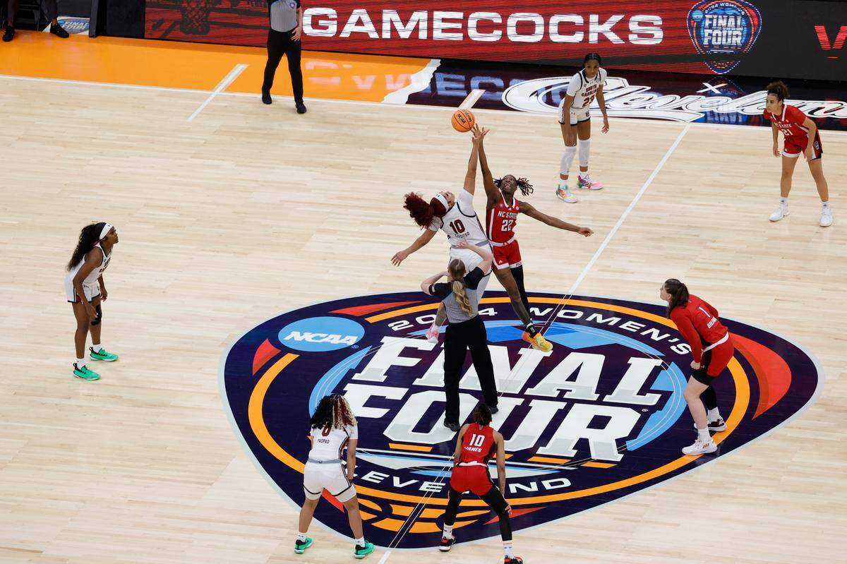 South Carolina’s Kamilla Cardoso (10) gets the ball over NC State’s Saniya Rivers (22) to start the Final Four game at Mortgage FieldHouse in Cleveland, Ohio on Friday April 5, 2024.