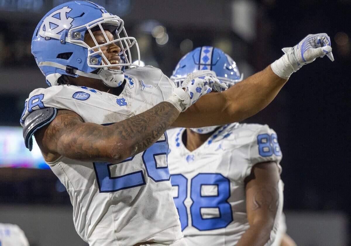 North Carolina’s Omarion Hampton (28) reacts after scoring on a three-yard run to give the Tar Heels’ a 28-21 lead in the second quarter on Saturday, October 28, 2023 at Bobby Dodd Stadium in Atlanta, Georgia.