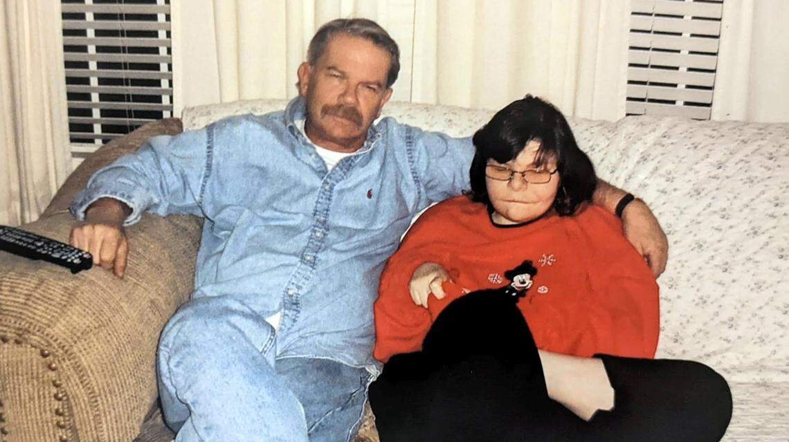 Jessica Price with her father, Larry Price, in 2012. She died Feb. 21, 2022.