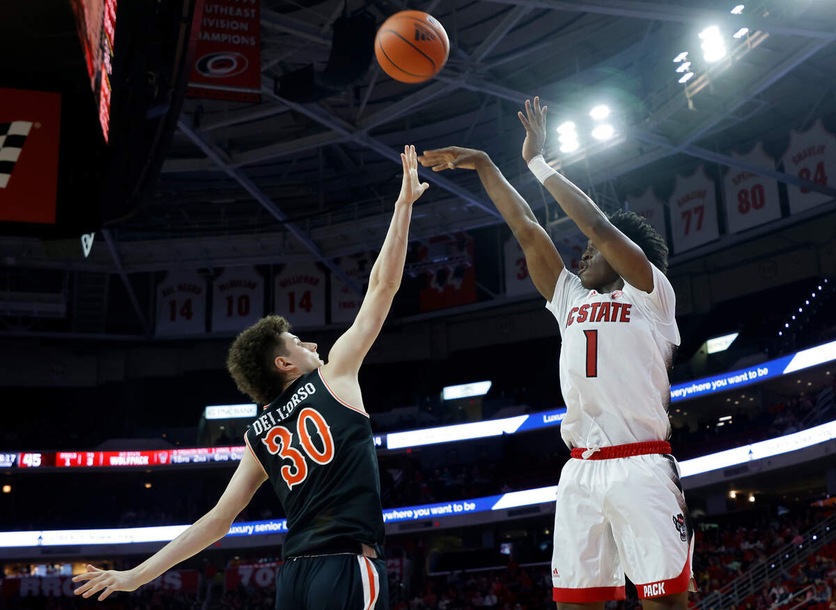 North Carolina State Wolfpack guard Jarkel Joiner shoots over Campbell Fighting Camels guard Anthony Dell’Orso during the second half of a men’s basketball game at PNC Arena in Raleigh, N.C. on Friday, Nov. 11, 2022.