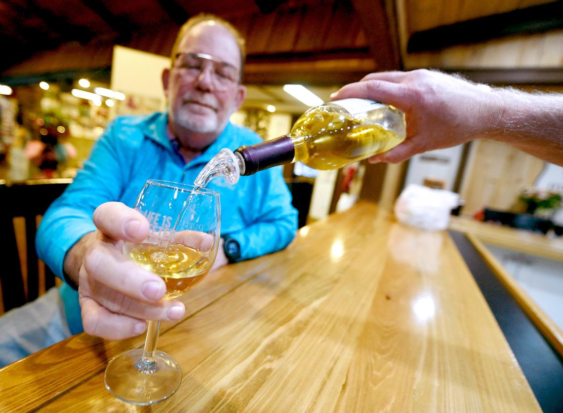 Alan Hargis has some wine poured for him at the Duplin Winery in Rose Hill, N.C. The winery has been in business since the early 1970s.
