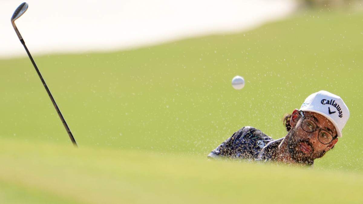 Akshay Bhatia hits from a bunker on the 13th hole during the second round of the U.S. Open golf tournament at Pinehurst No. 2.