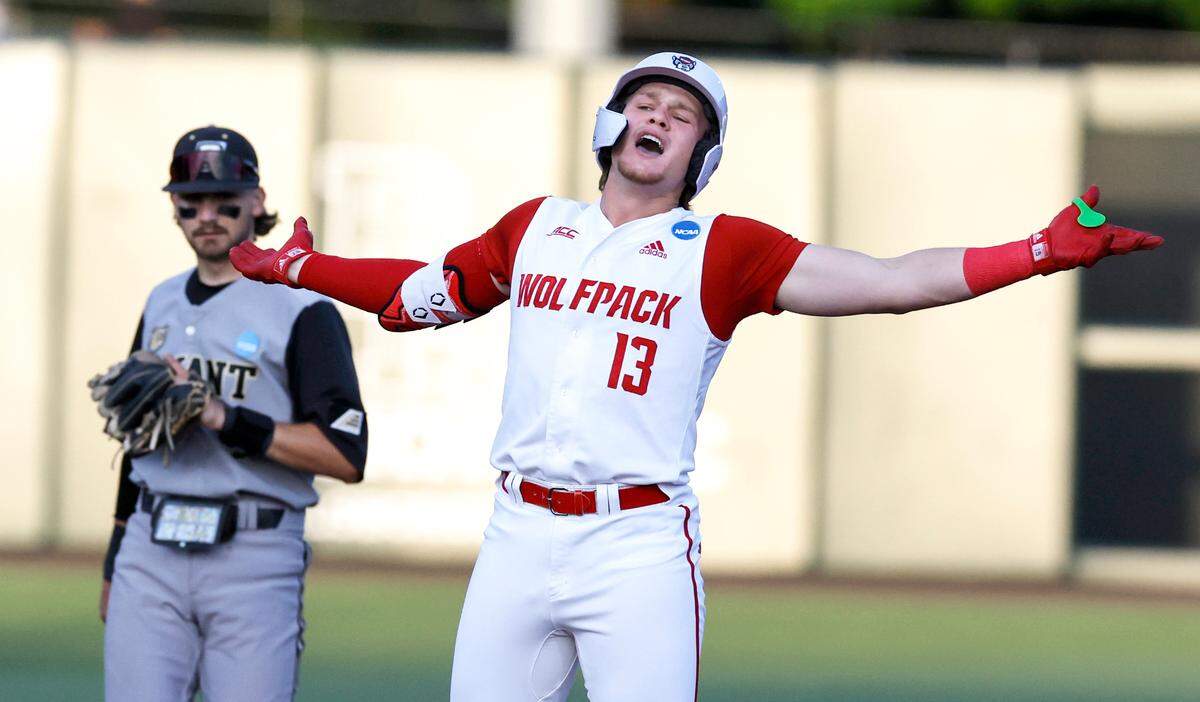 N.C. State’s Alex Sosa (13) celebrates hitting a double in the third inning during N.C. State’s game against Bryant in the NCAA Raleigh Regional at Doak Field Friday, May 31, 2024.