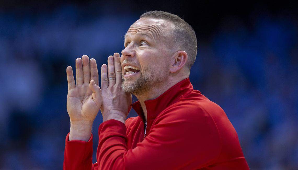 Louisville coach Pat Kelsey direct his team on offense in the first half against North Carolina on Monday, February 23, 2026 at the Smith Center in Chapel Hill, N.C.