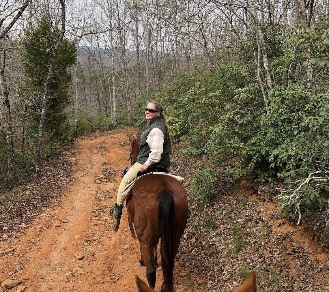 Maggie Monty, an unaffiliated voter, pictured while being a trail guide for Cedar Creek Stables in Lake Lure, N.C.