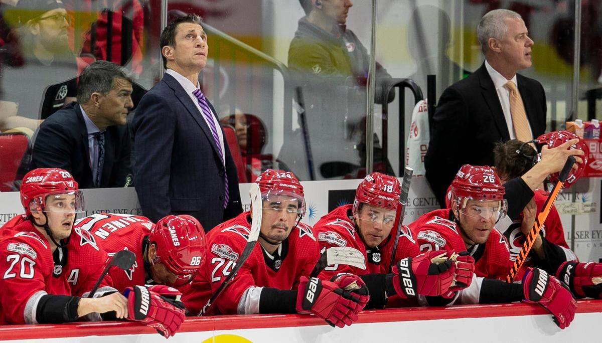 Carolina Hurricanes’ coach Rod Brind’Amour eyes the scoreboard during a time out in the second period against Detroit on Tuesday, April 11, 2023 at PNC Arena in Raleigh, N.C.