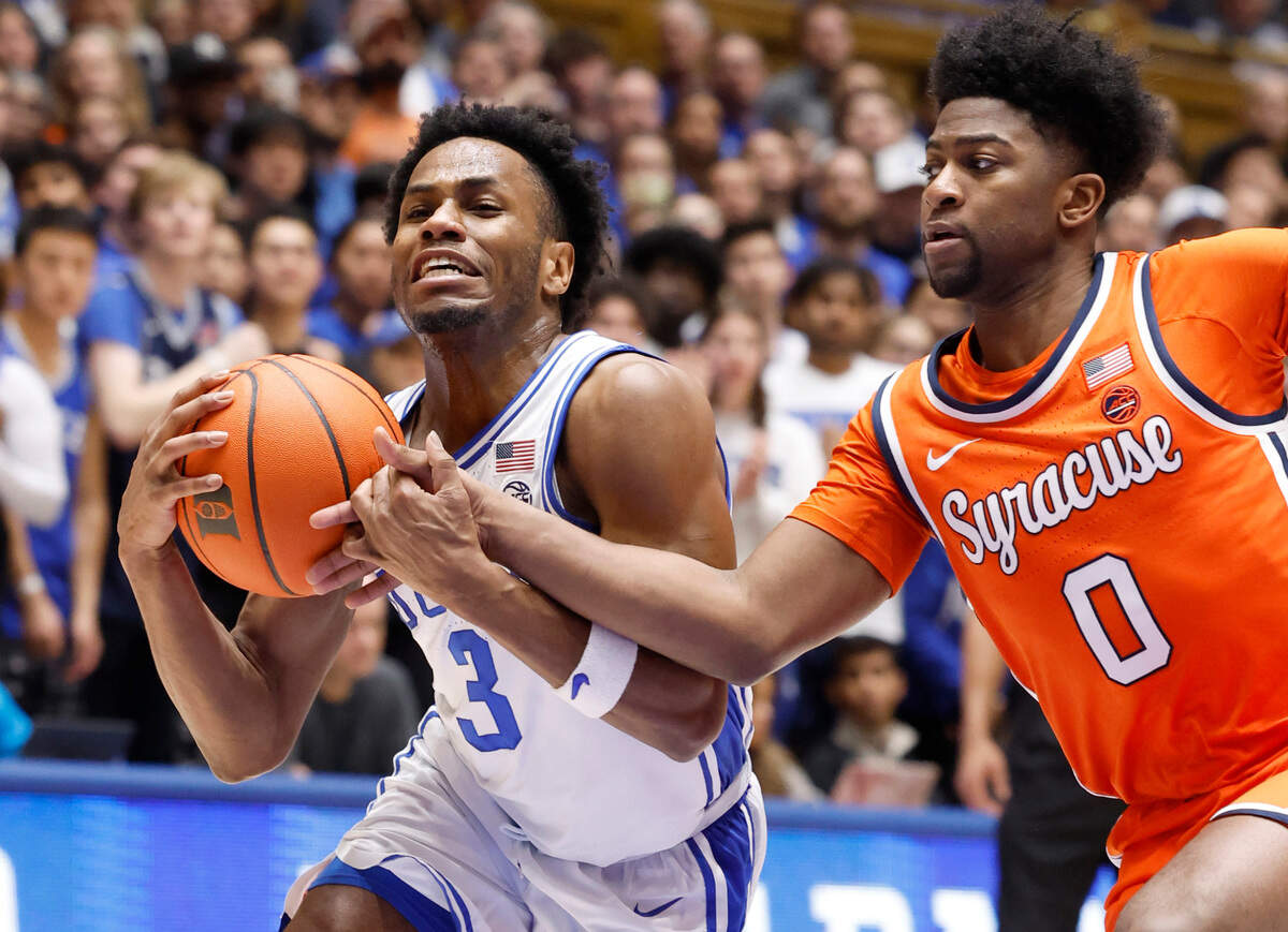 Duke’s Jeremy Roach (3) is fouled by Syracuse’s Kyle Cuffe Jr. (0) during the second half of Duke’s 86-66 victory over Syracuse at Cameron Indoor Stadium in Durham, N.C., Tuesday, Jan. 2, 2024.
