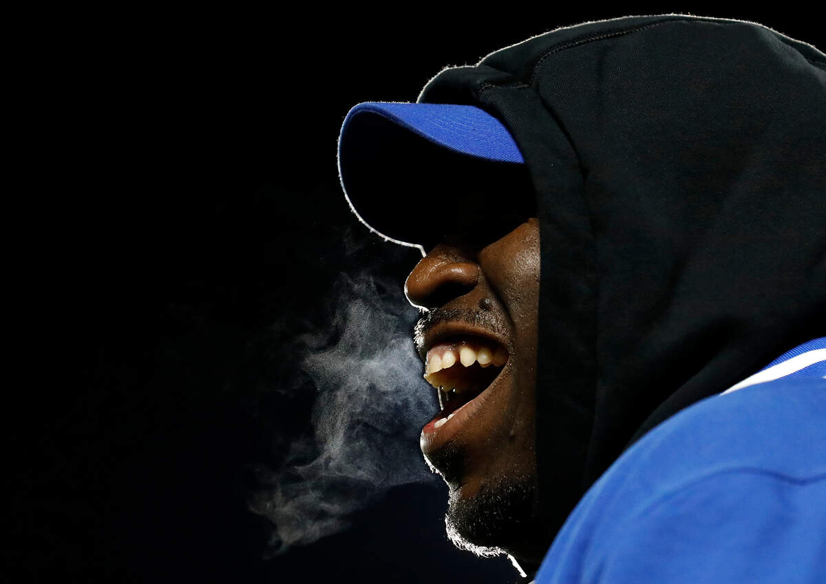A member of the Duke football staff smiles during the second half of the Blue Devils’ 31-28 win over Virginia Tech on Saturday, Nov. 23, 2024, at Wallace Wade Stadium in Durham, N.C.