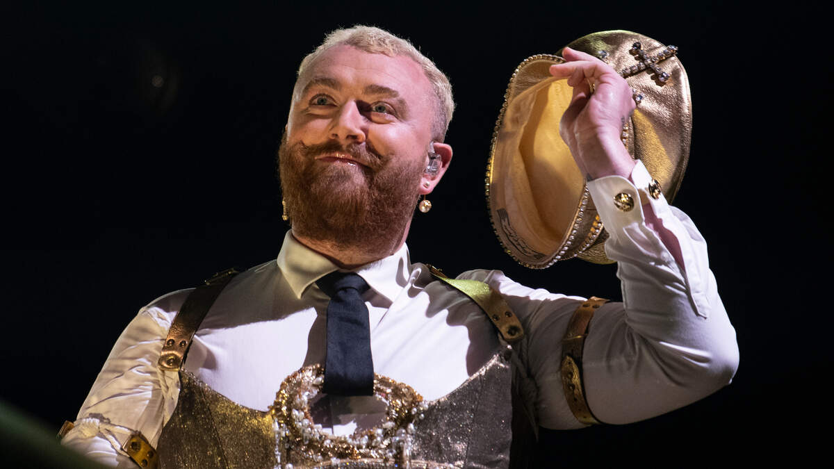 Sam Smith greets the crowd during their concert on the “Gloria” tour, Tuesday night, Aug. 1, 2023 in Raleigh, N.C.