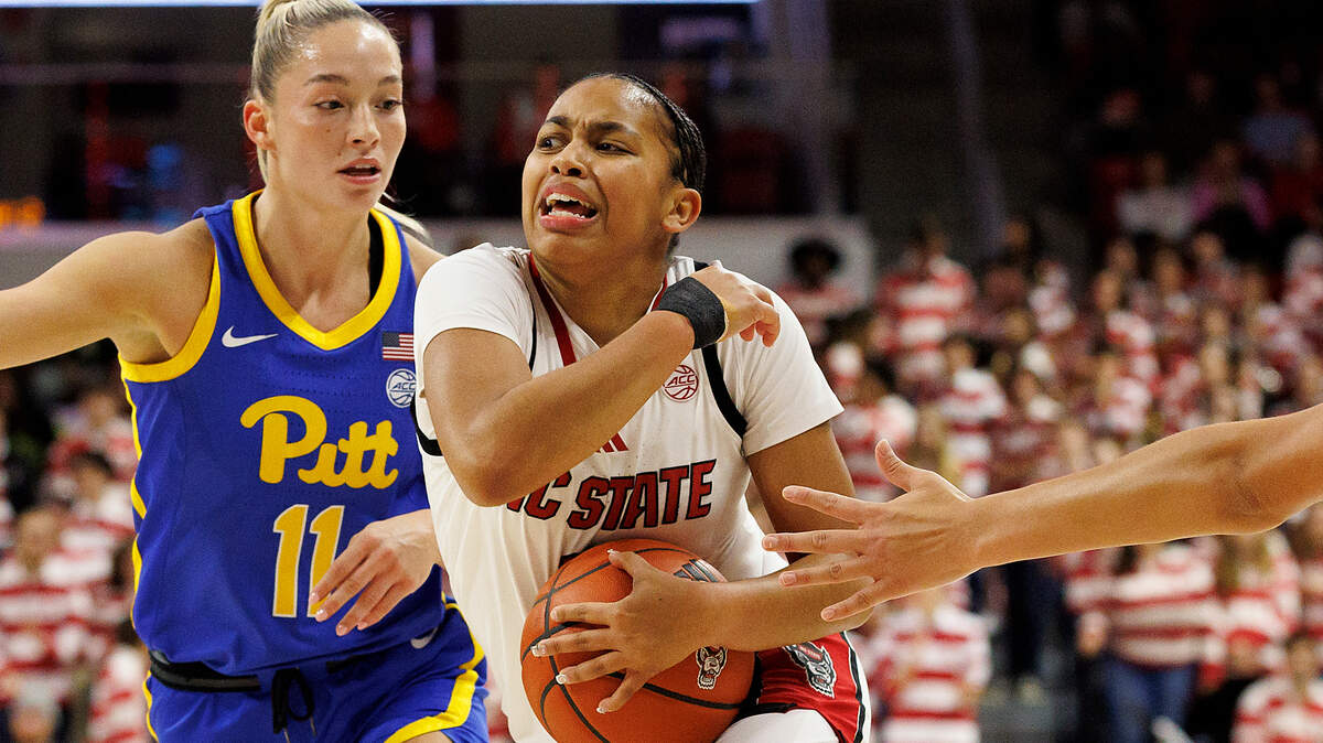 N.C. State’s Zamareya Jones drives past Pittsburgh’s Marley Washenitz during the second half of the Wolfpack’s 83-67 win on Thursday, Jan. 16, 2025, at Reynolds Coliseum in Raleigh, N.C.