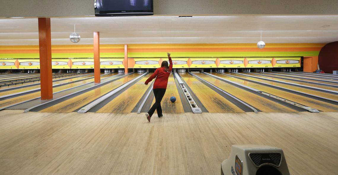 N.C. State freshman Gabrielle Faulkner gets some last practice in during bowling class at The Alley on Hillsborough St. in Raleigh Thursday, Nov. 17, 2016. The bowling alley, a fixture on Hillsborough St. since the 1960s, is closing and will be replaced by a Target store.
