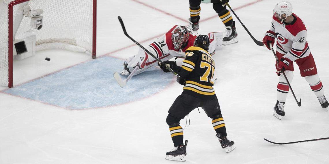 Boston’s Connor Clifton (75) scores on Carolina Hurricanes goalie Petr Mrazek (34) in the second period of Game 2 of the Eastern Conference finals on Sunday, May 12, 2019 at TD Garden in Boston, Mass.