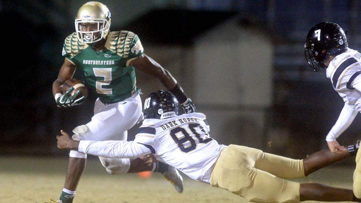Northeastern's J.R. Walker, left, tweeted his top-five colleges, and UNC, Duke and NC State are on the list.
