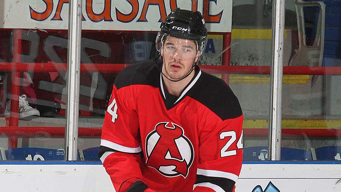 Eric Gelinas skates during warmups for the Albany Devils of the American Hockey League against the Portland Pirates in Lewiston Maine in 2013.