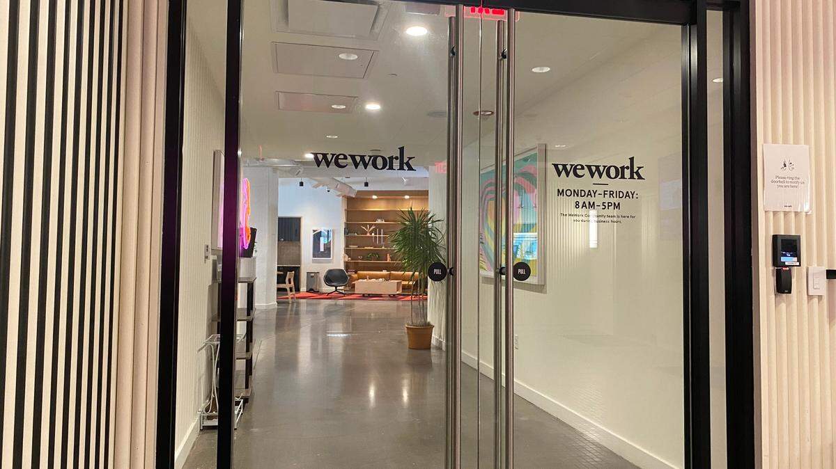 WeWork office entrance in downtown Durham, NC, the morning after the company filed for Chapter 11 bankruptcy. 