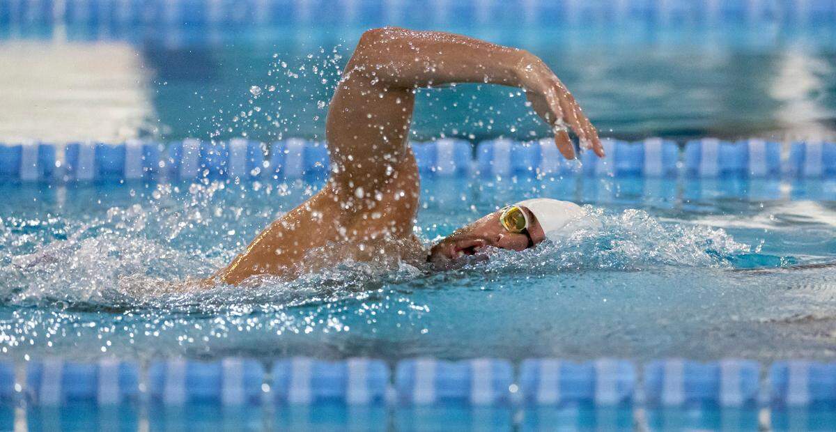 Olympic medalist and N.C. State graduate Ryan Held was the first to enter the pool during the 2024 United States Olympic Swim Team practice on Saturday, July 6, 2024 at the Triangle Aquatic Center in Cary, N.C.