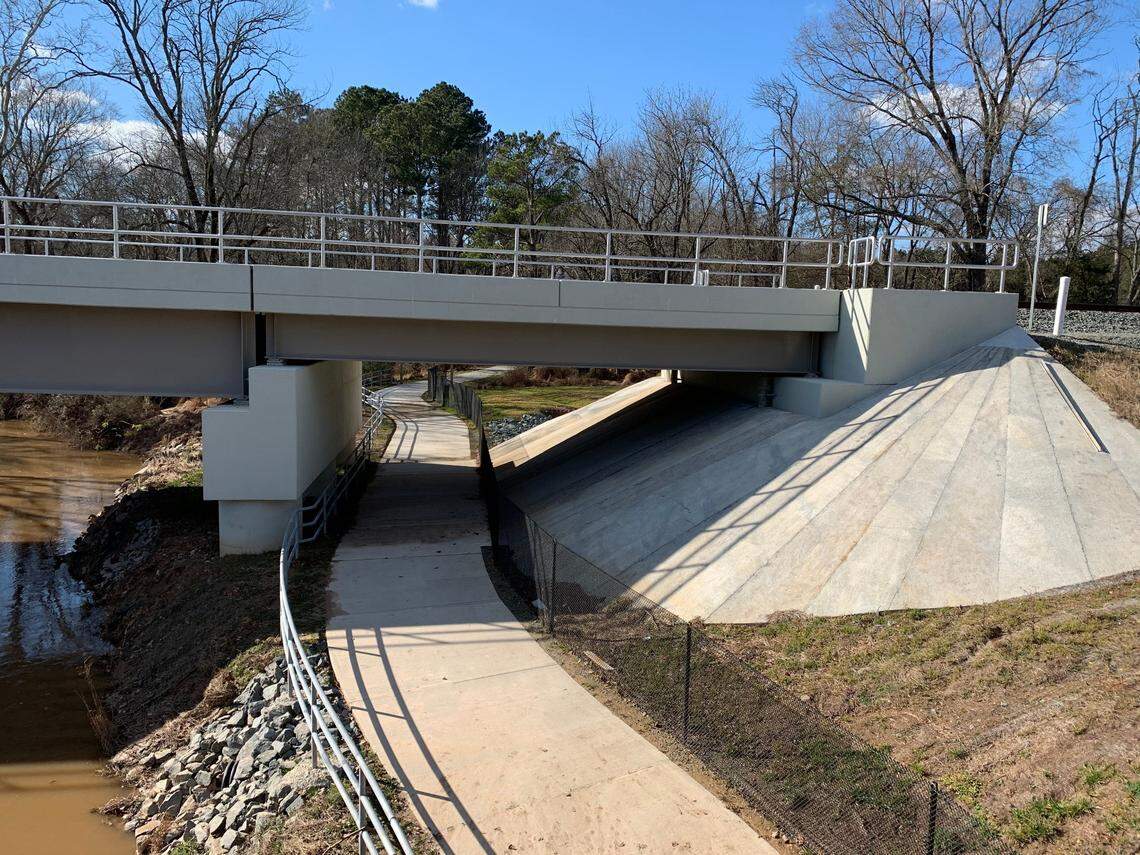 The new North Carolina Railroad bridge over Crabtree Creek in Morrisville makes room for the greenway trail underneath.