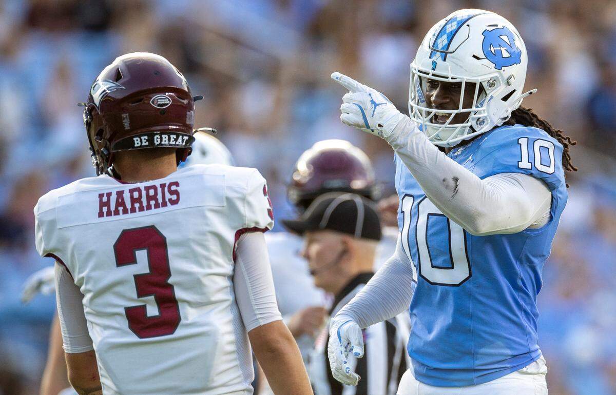North Carolina defensive lineman Desmond Evans (10) has a word with N.C. Central quarterback Walker Harris (3) in the second quarter on Saturday, September 14, 2024 at Kenan Stadium in Chapel Hill, N.C.