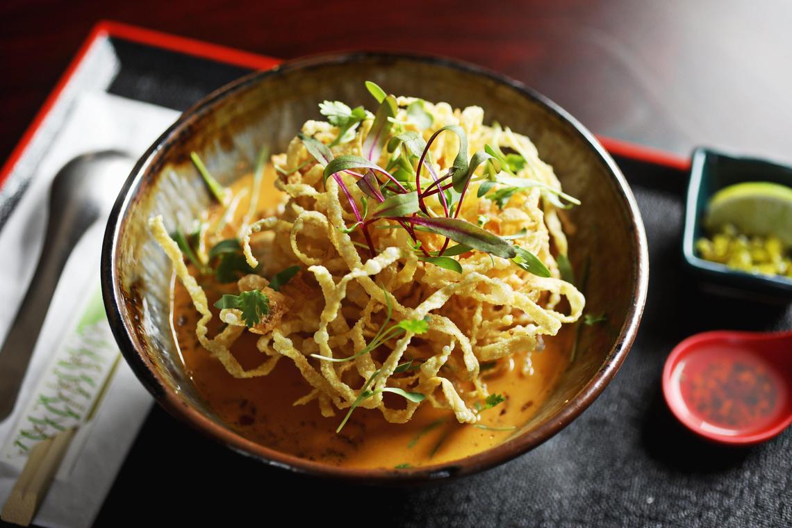 Zanyu’s khao soi noodles are made up of egg noodles in a northern Thai red curry riddled with chicken, fried shallots and pickled mustard greens. The crowning touch is a tangle of crispy wonton noodles floating on the soup.