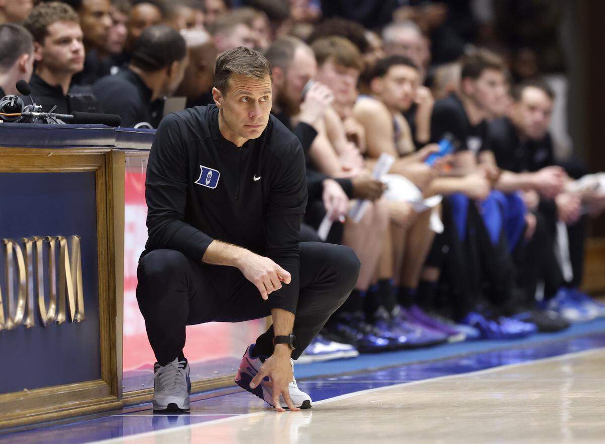 Duke head coach Jon Scheyer watches during the first half of the Blue Devils’ game against Florida in the ACC/SEC Challenge on Tuesday, Dec. 2, 2025 at Cameron Indoor Stadium in Durham, N.C.
