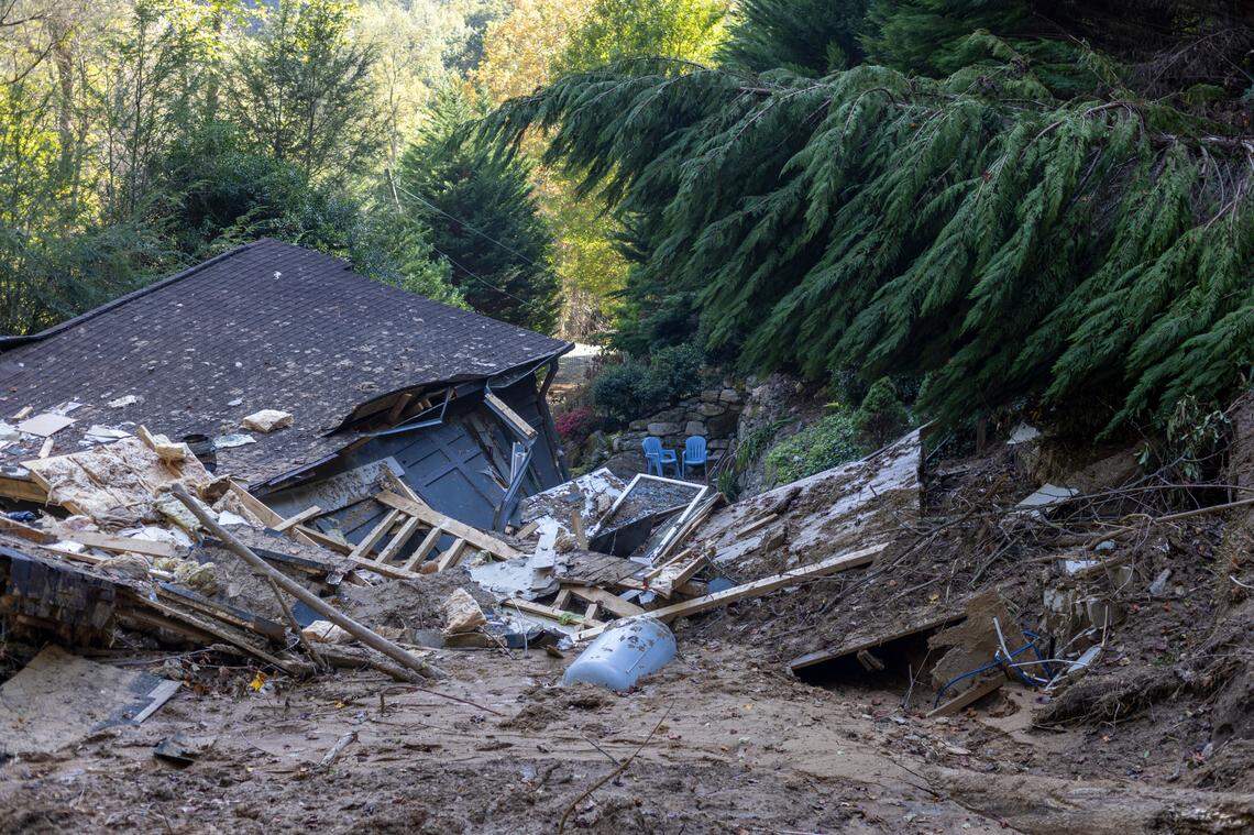 A landslide during Hurricane Helene destroyed this home on US 176 between Saluda and Tryon, photographed on Monday, October 7, 2024. A Polk County spokeswoman confirmed the death of a woman who lived in the structure. Her husband survived and walked next door to seek help from neighbors Michael Derwort and his mom Margie Derwort