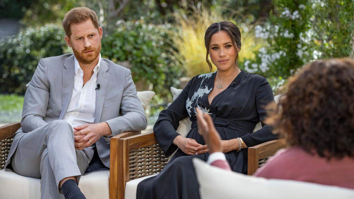 Prince Harry and Meghan, The Duke and Duchess of Sussex, with Oprah Winfrey.