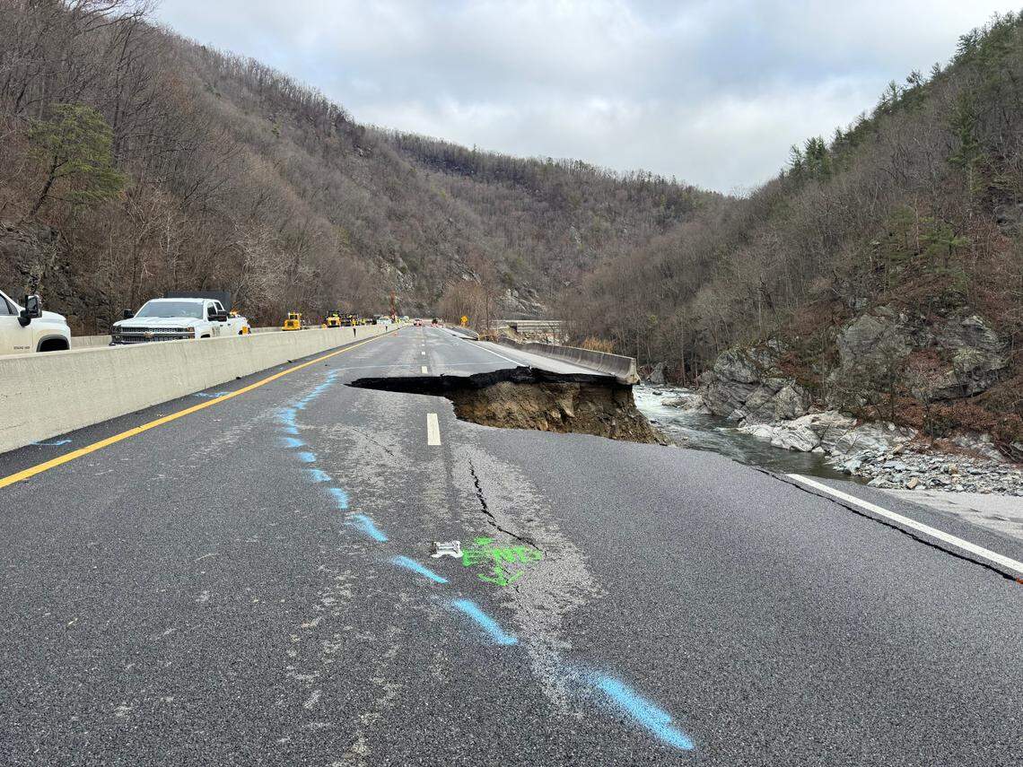 A 60-foot section of eastbound Interstate 40 fell into the Pigeon River this week, forcing the N.C. Department of Transportation to postpone plans to reopen the westbound lanes to traffic in early January 2025.