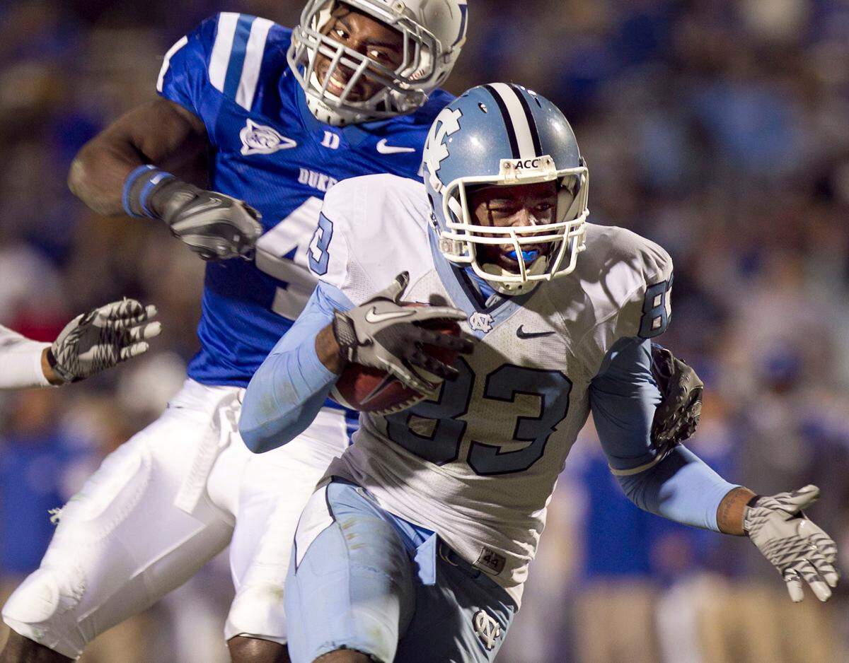 North Carolina’s Dwight Jones, breaking away from Duke’s Walt Canty for a 35-yard gain on Nov. 27, figures to be key receiver for Tar Heels quarterback T. J. Yates today against Tennessee.____Robert Willett - ROBERT WILLETT-rwillett@newsobserver.com