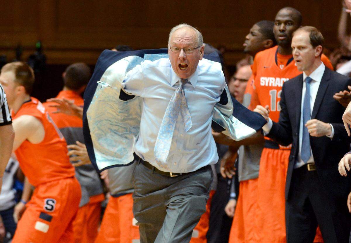 Syracuse head coach Jim Boeheim charges the floor after a charge is called on Syracuse forward C.J. Fair (5) in the closing seconds. Boeheim was ejected and called for a technical. Duke beat Syracuse 66-60 at Cameron Indoor Stadium in Durham, N.C. Saturday Feb. 22, 2014.