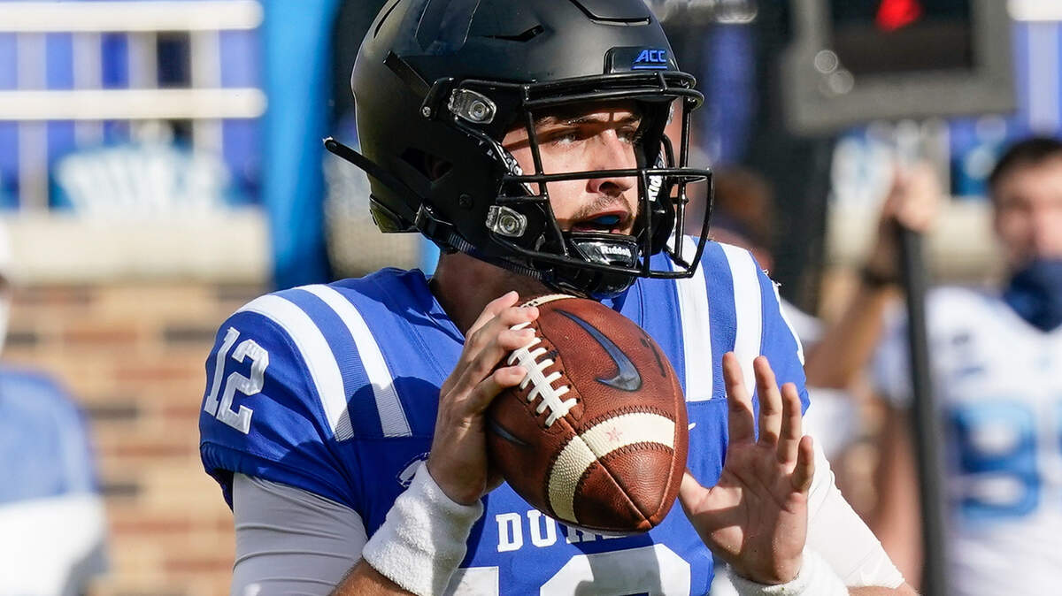 Duke Blue Devils quarterback Gunnar Holmberg (12) drops back to pass against the North Carolina Tar Heels during the second half at Wallace Wade Stadium.