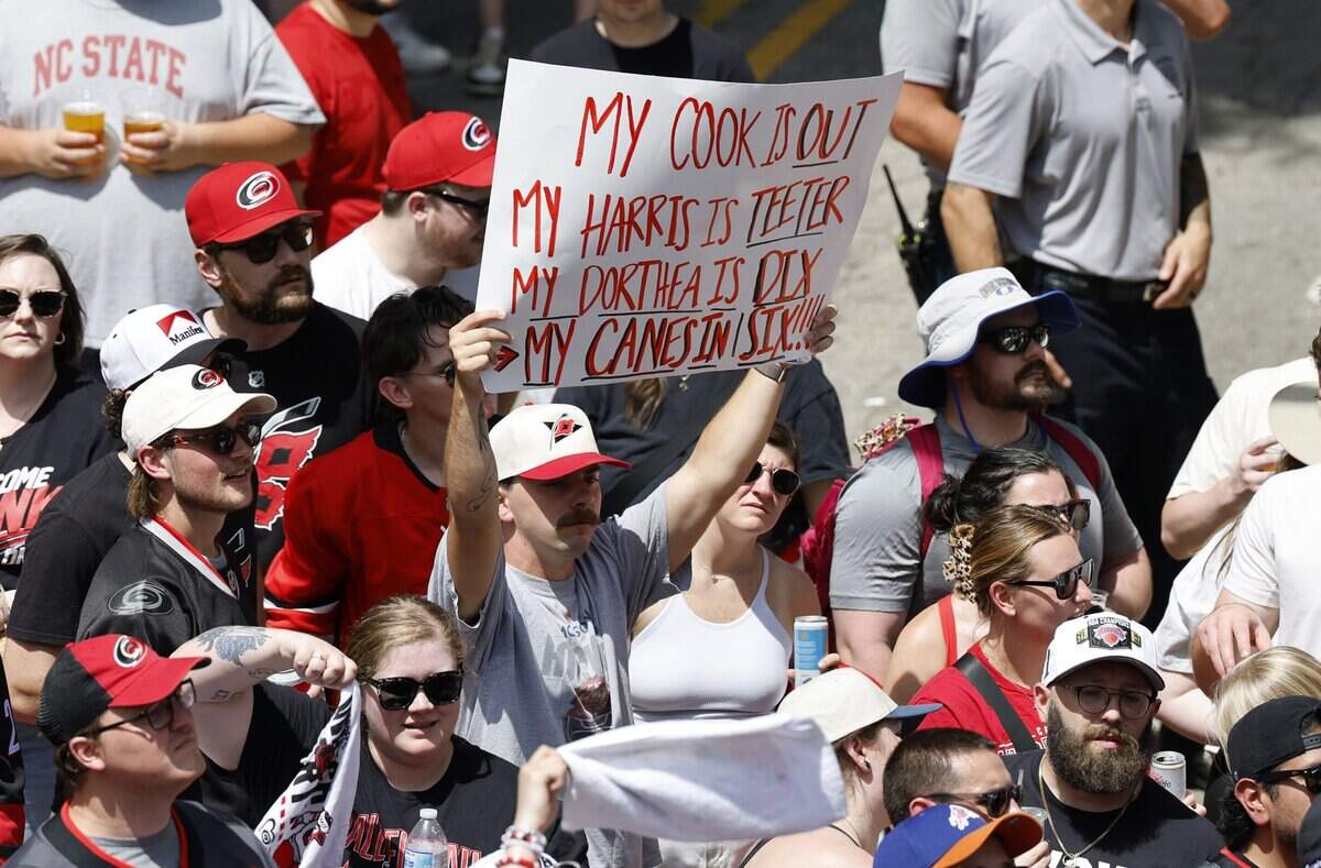 Fans cheer on the Canes during a parade and rally for the Carolina Hurricanes in downtown Raleigh Saturday, June 20, 2026.