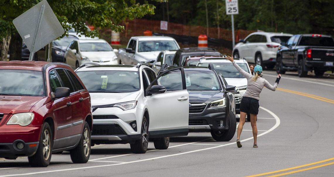 Carpool lines outside Leesville Road Elementary, Middle and High Schools were longer than usual Friday, Oct. 29, 2021. Wake County parents and students experienced bus delays and school officials warned of widespread delays as drivers began an expected sickout.