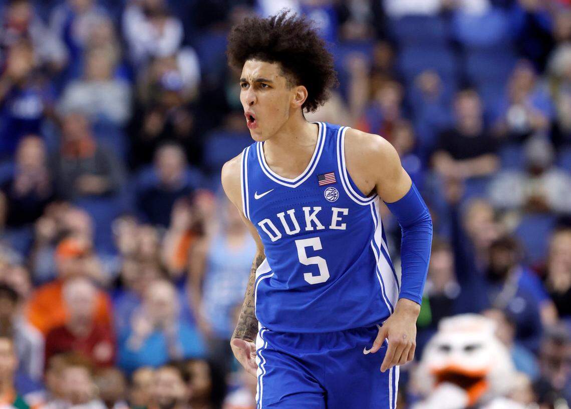 Duke’s Tyrese Proctor celebrates after hitting a three-pointer during the first half of Duke’s game against Miami in the semifinals of the ACC Men’s Basketball Tournament in Greensboro, N.C., Friday, March 10, 2023.