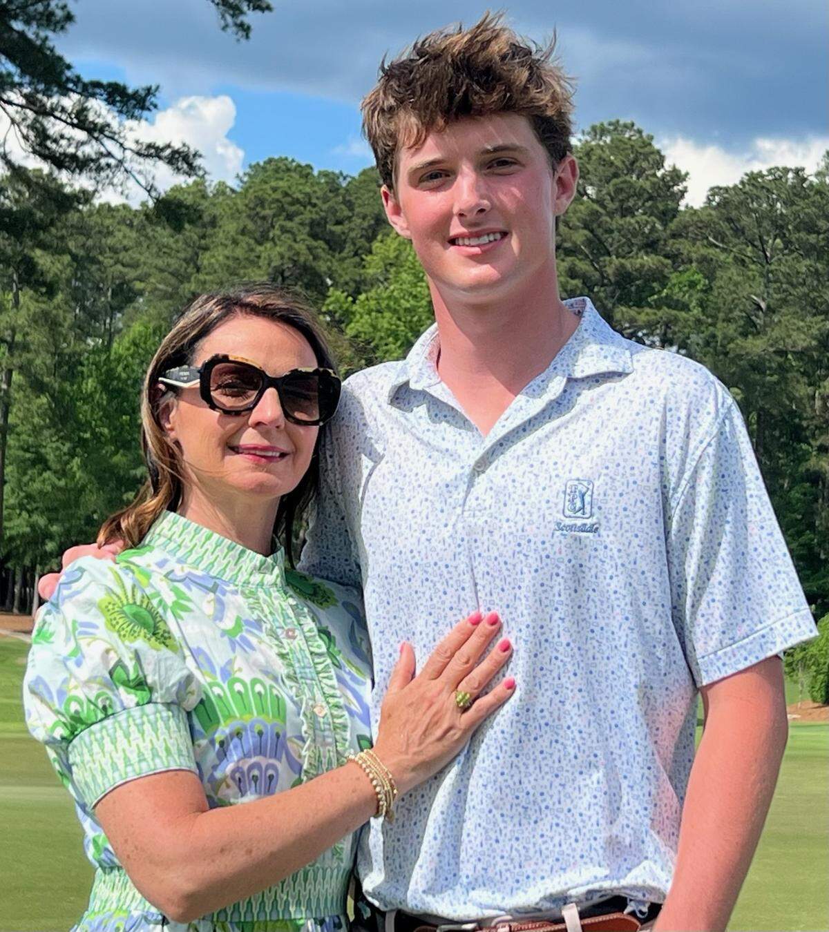 Holly and Andrew Neal pose for a photo at MacGregor Downs Country Club in Cary, North Carolina. Holly has been instrumental in helping her son, Andrew, evolve as a championship golfer, and a standout student.