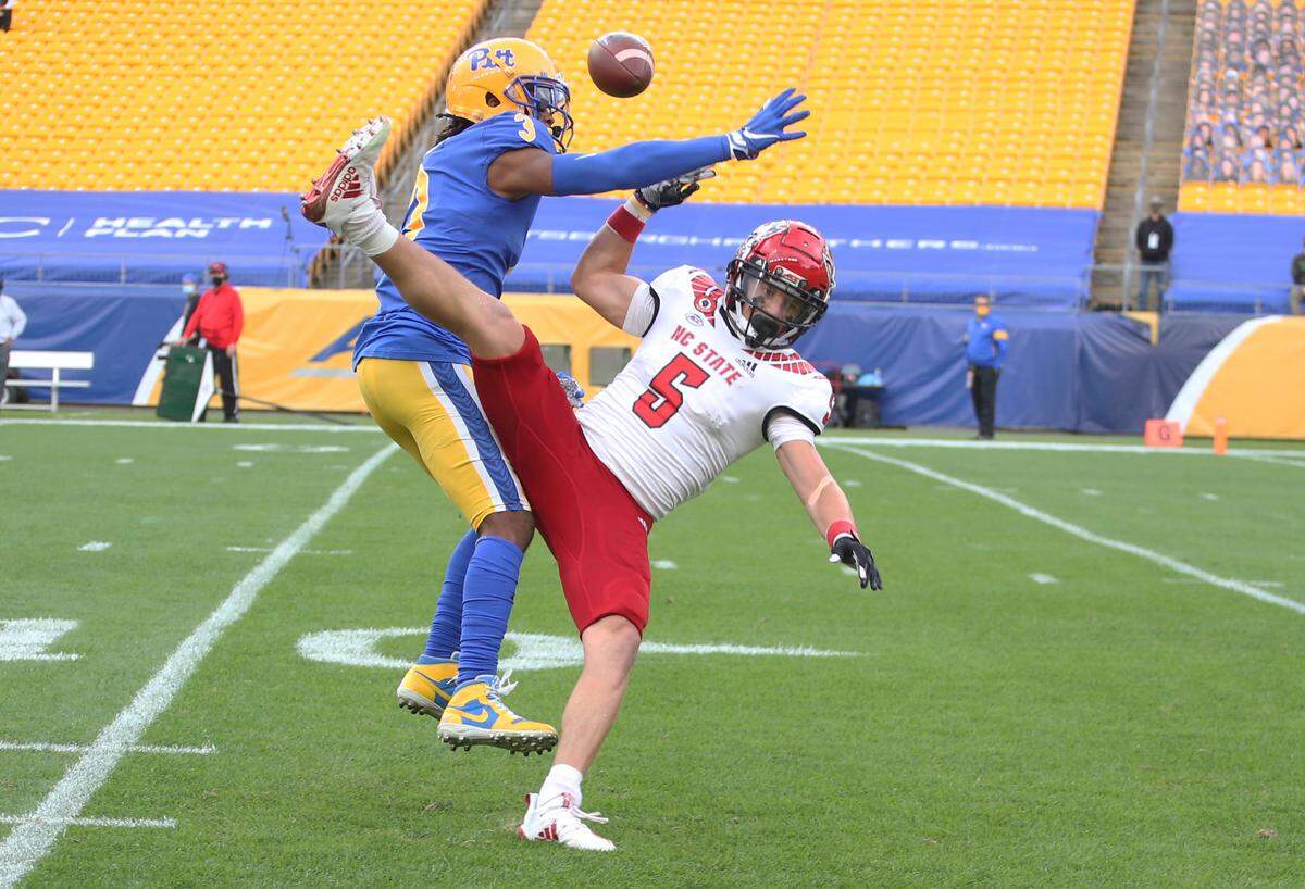 Pittsburgh Panthers defensive back Damar Hamlin (3) commits pass interference on N.C. State’s wide receiver Thayer Thomas (5) during the first quarter at Heinz Field.