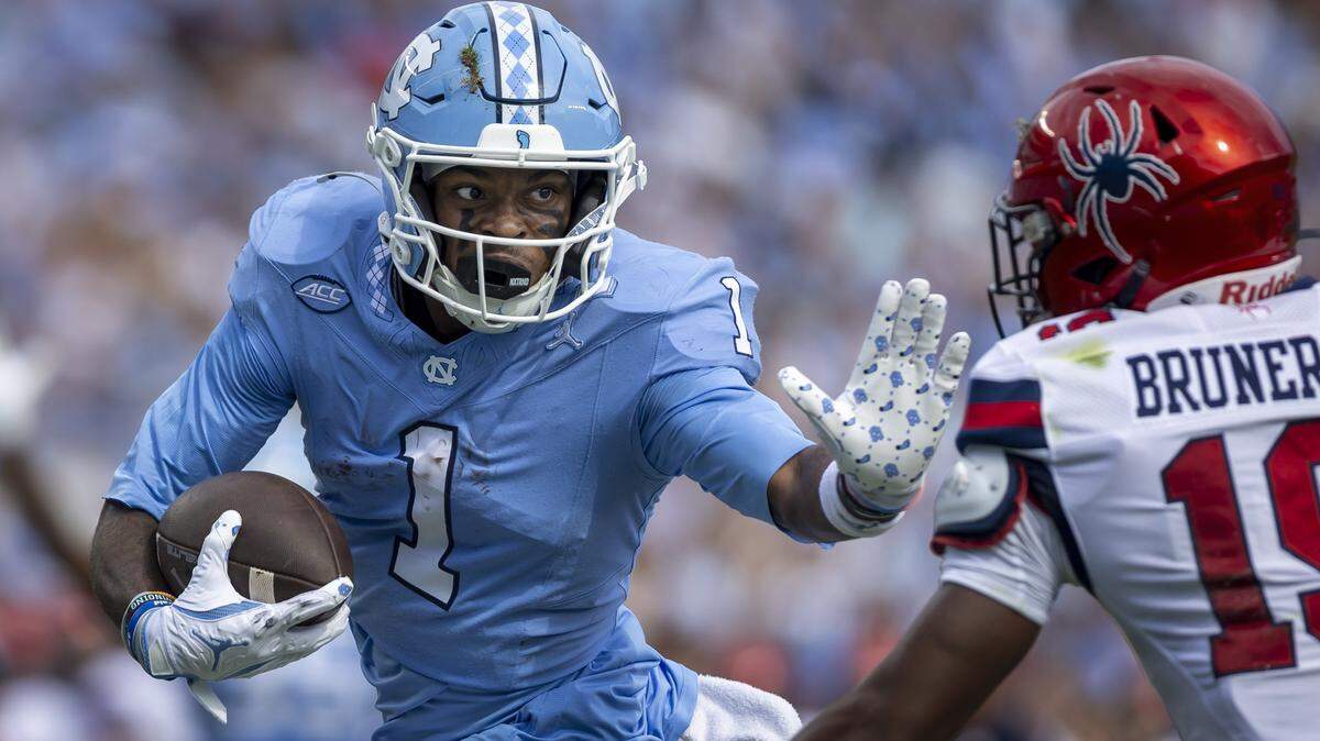 North Carolina wide receiver Jordan Shipp (1) scores on a 29-yard pass reception from quarterback Gio Lopez (7) in the first quarter on Saturday, September 13, 2025 at Kenan Stadium in Chapel Hill, N.C.