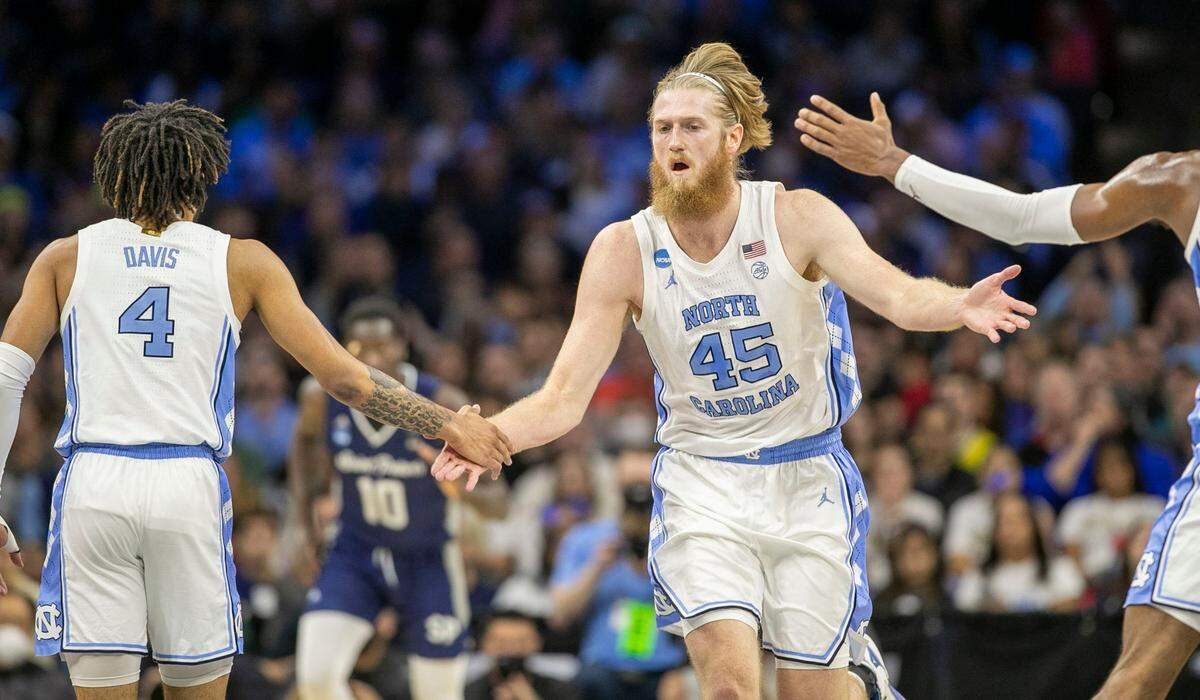 North Carolina’s Brady Manek (45) reacts after sinking a basket to give the Tar Heels a 21-7 lead over Saint Peters in the first half during the NCAA East Regional final on Sunday, March 27, 2022 at Wells Fargo Center in Philadelphia, Pa.
