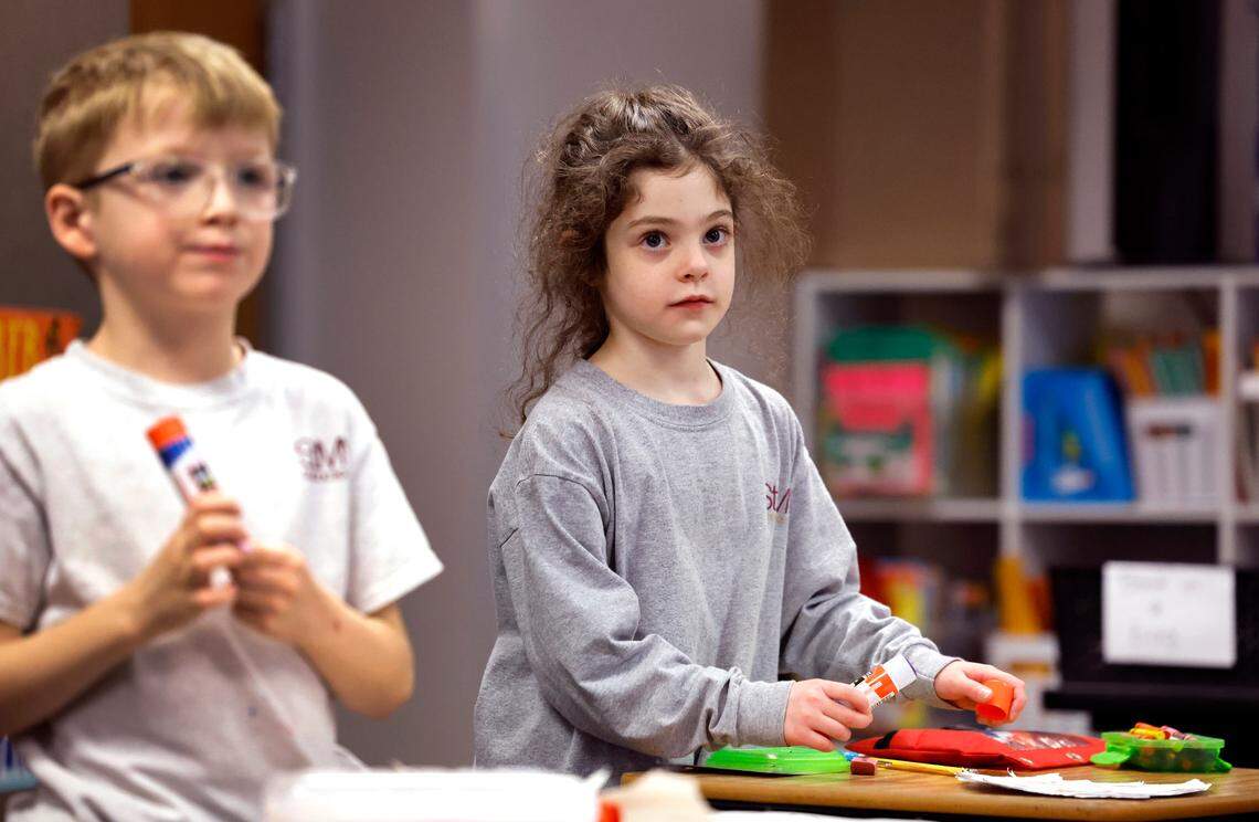 Amelia Copersito works in her first grade class at St. Mary Magdalene Catholic School in Apex on Jan. 24.