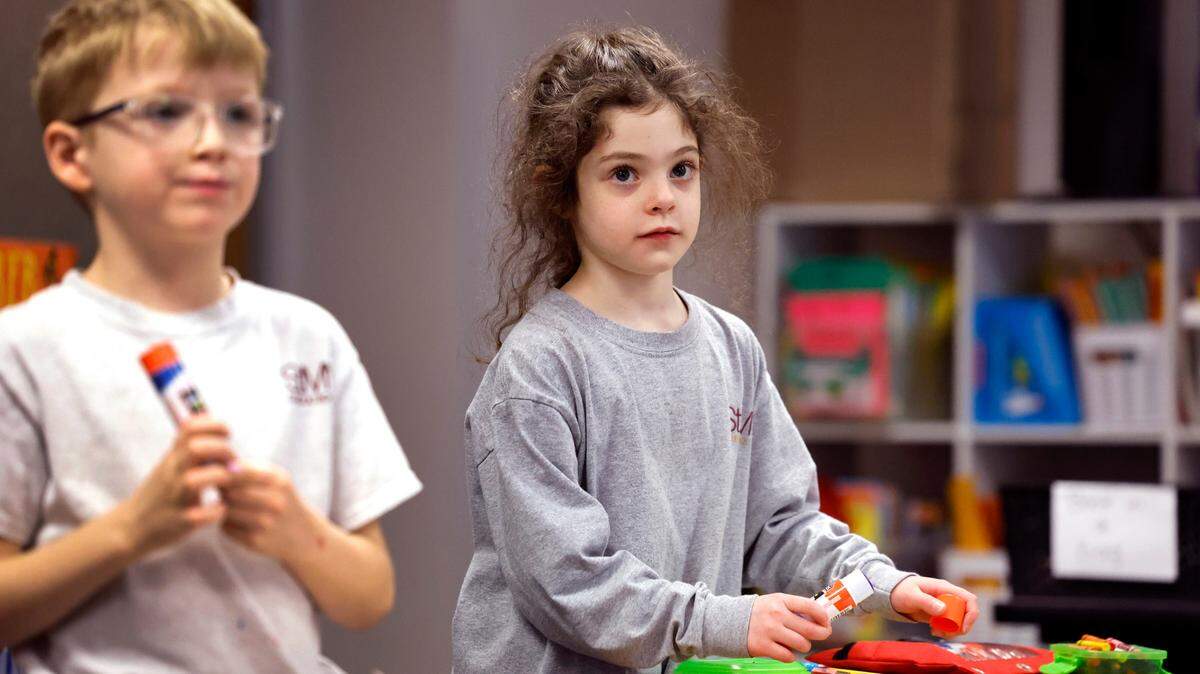 Amelia Copersito works in her first grade class at St. Mary Magdalene Catholic School in Apex, N.C., Tuesday, Jan. 24, 2024. The state has expanded funding for more students like Copersito to get an Opportunity Scholarship to attend a private school