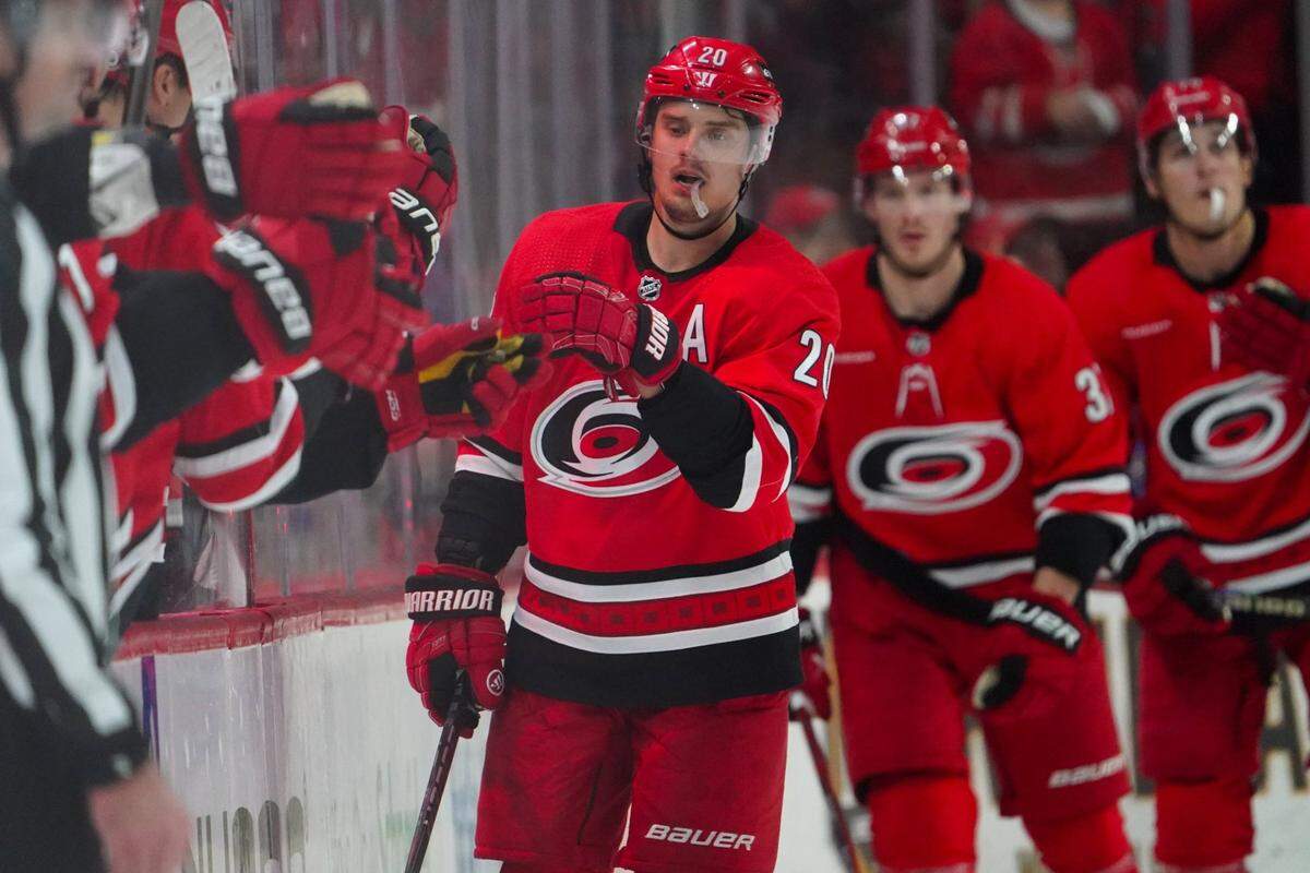 Mar 2, 2024; Raleigh, North Carolina, USA; Carolina Hurricanes center Sebastian Aho (20) celebrates his goal against the Winnipeg Jets during the second period at PNC Arena. Mandatory Credit: James Guillory-USA TODAY Sports