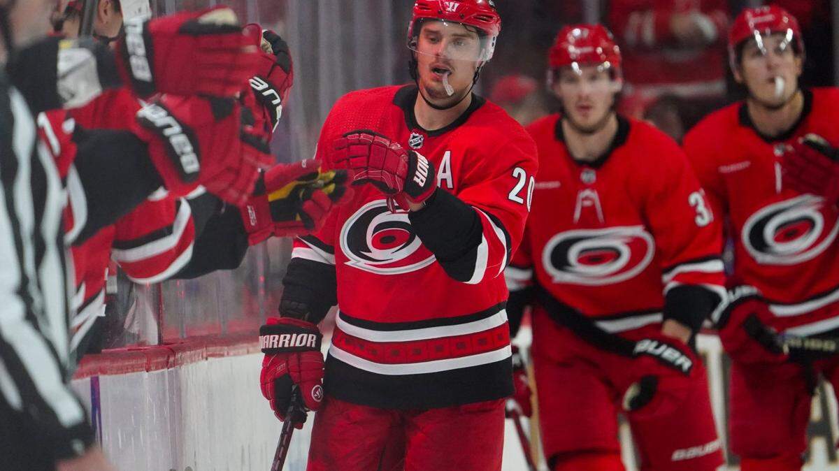 Mar 2, 2024; Raleigh, North Carolina, USA; Carolina Hurricanes center Sebastian Aho (20) celebrates his goal against the Winnipeg Jets during the second period at PNC Arena. Mandatory Credit: James Guillory-USA TODAY Sports