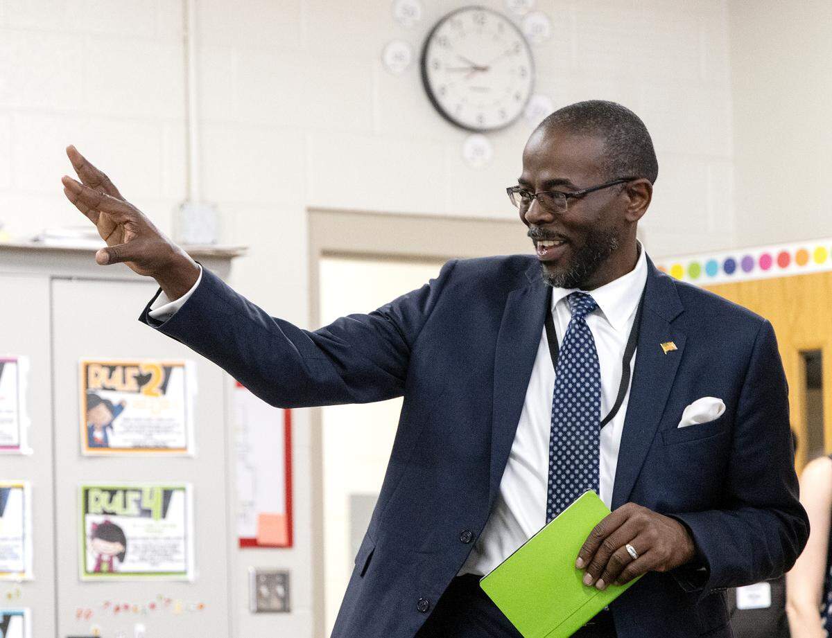 New Wake County Superintendent Robert Taylor bids students farewell following a classroom visit at Rolesville Elementary School on his first day on the job, Monday, Oct. 2, 2023, in Rolesville, N.C.