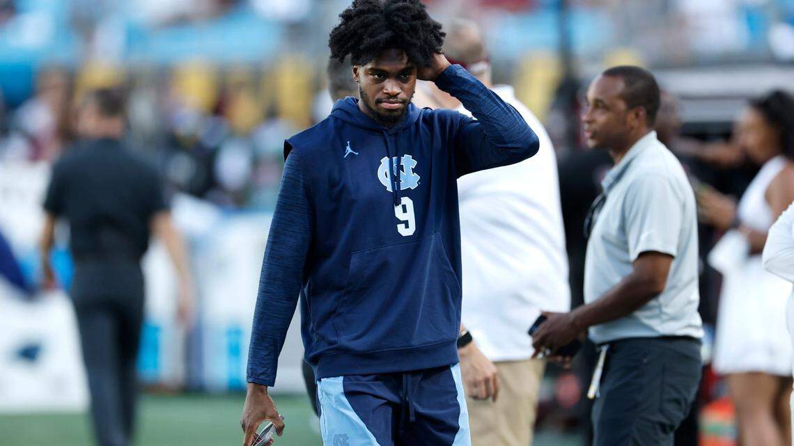 North Carolina wide receiver Tez Walker walks down the field before UNC’s game against South Carolina in the Duke’s Mayo Classic at Bank of America Stadium in Charlotte on Sept. 2, 2023.