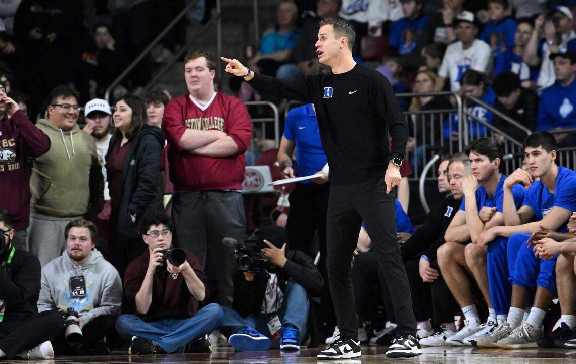 Duke Blue Devils head coach Jon Scheyer directs his team from the sideline during the first half against the Boston College Eagles at Conte Forum Sat. Jan. 18, 2025.
