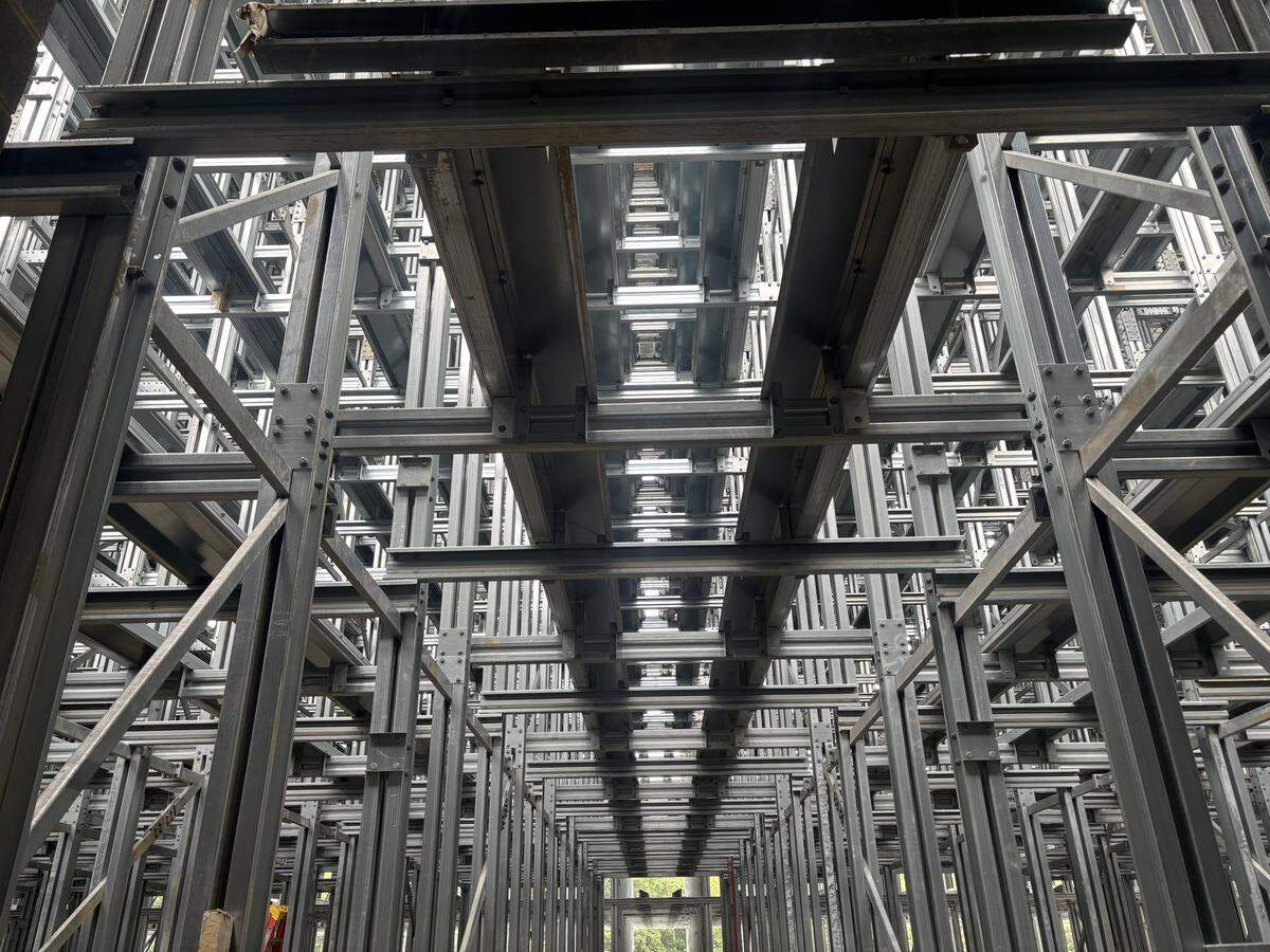 A look from below at the 10-story warehouse Saint-Gobain is building in Oxford, N.C. to store glass mat rolls used in shingle production.